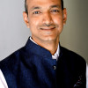 DR. AMBUJ ROY